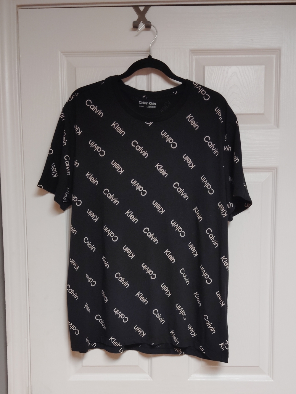 Calvin Klein Black Tee with Allover White Logo Print